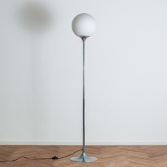 Glass ball lamp on chrome leg