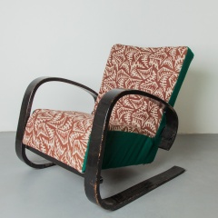 a pair of art deco armchairs